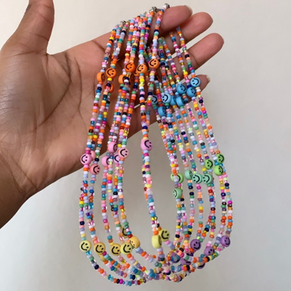 Colorful pearl necklace with happy smiles 